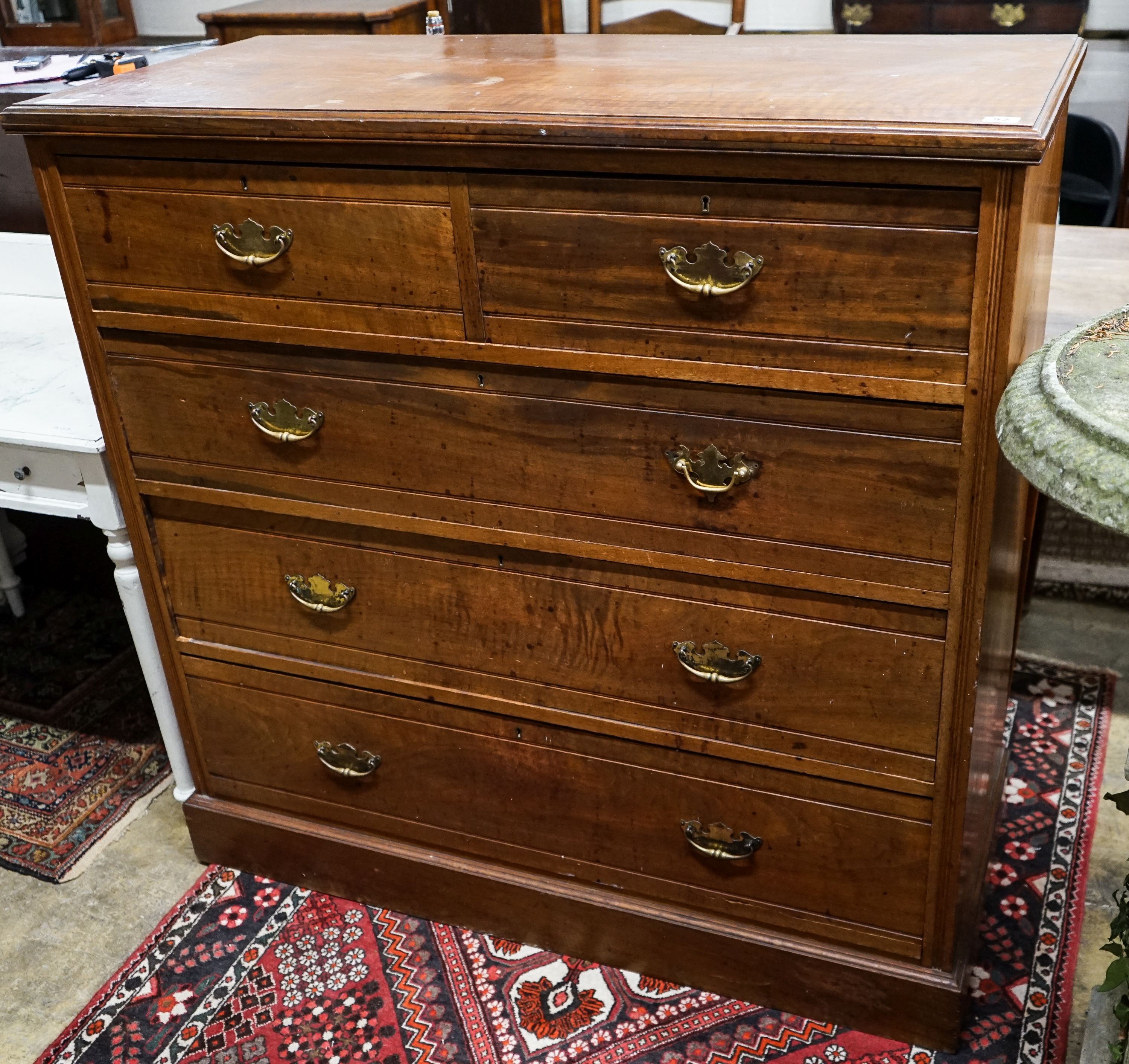 A late Victorian walnut chest of drawers, width 120cm, depth 52cm, height 118cm